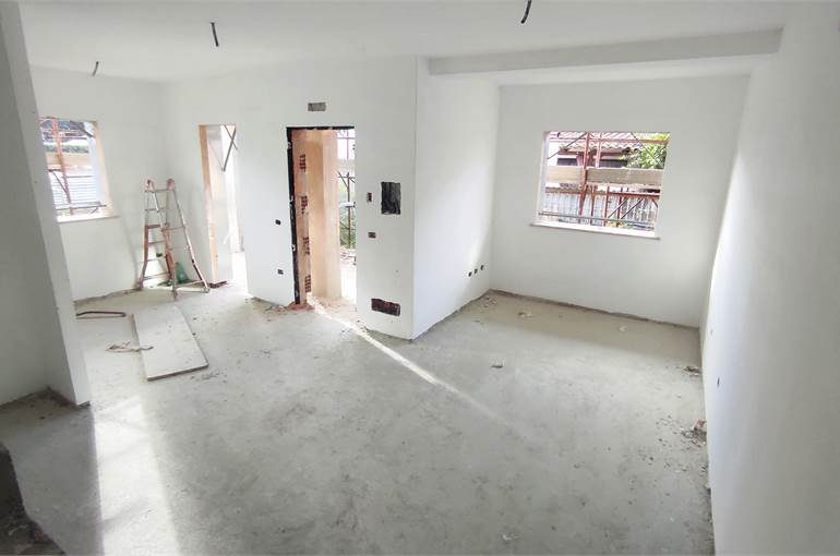 Soggiorno con cucina a vista