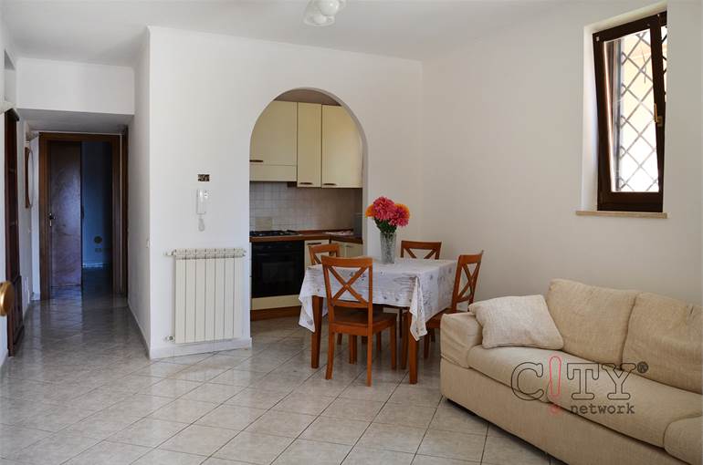 Soggiorno con cucina a vista