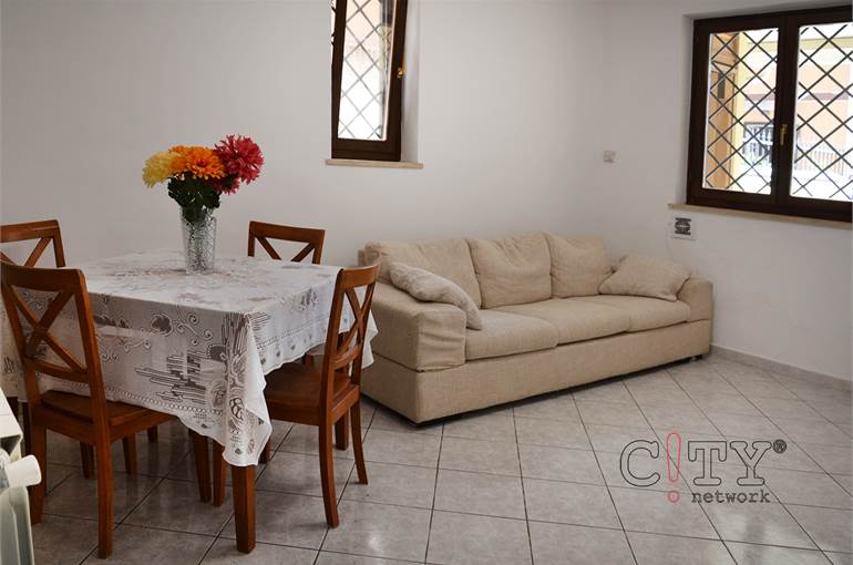 Soggiorno con cucina a vista