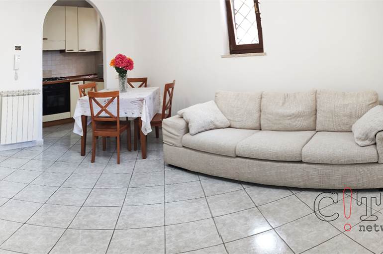 Soggiorno con cucina a vista