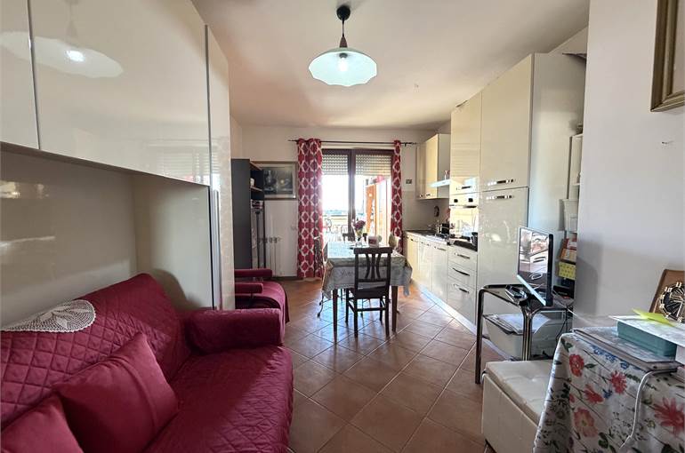 Soggiorno con cucina a vista