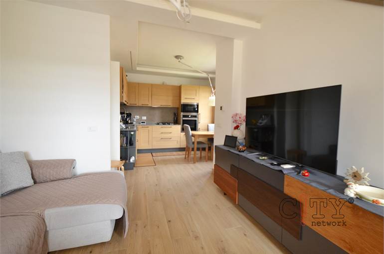 Soggiorno con cucina a vista